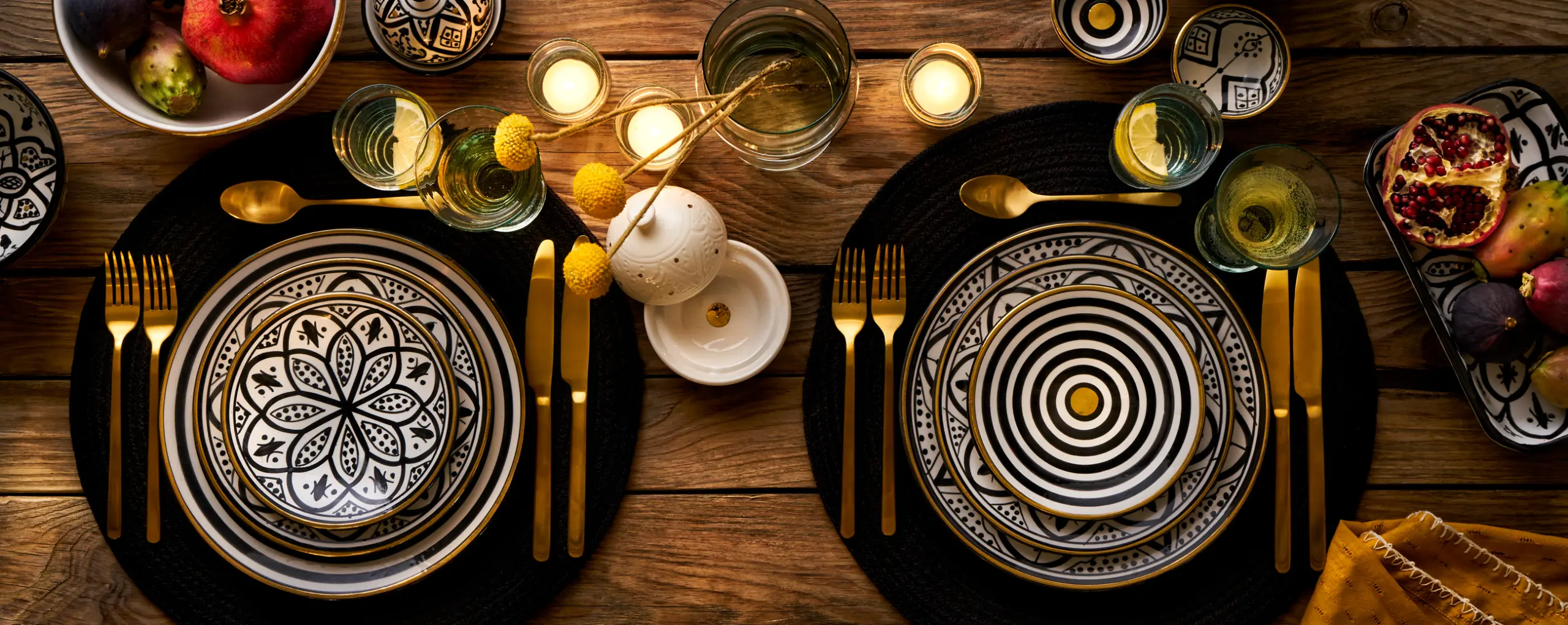 tabletop photography of plates and decoration, glasses and cutlery