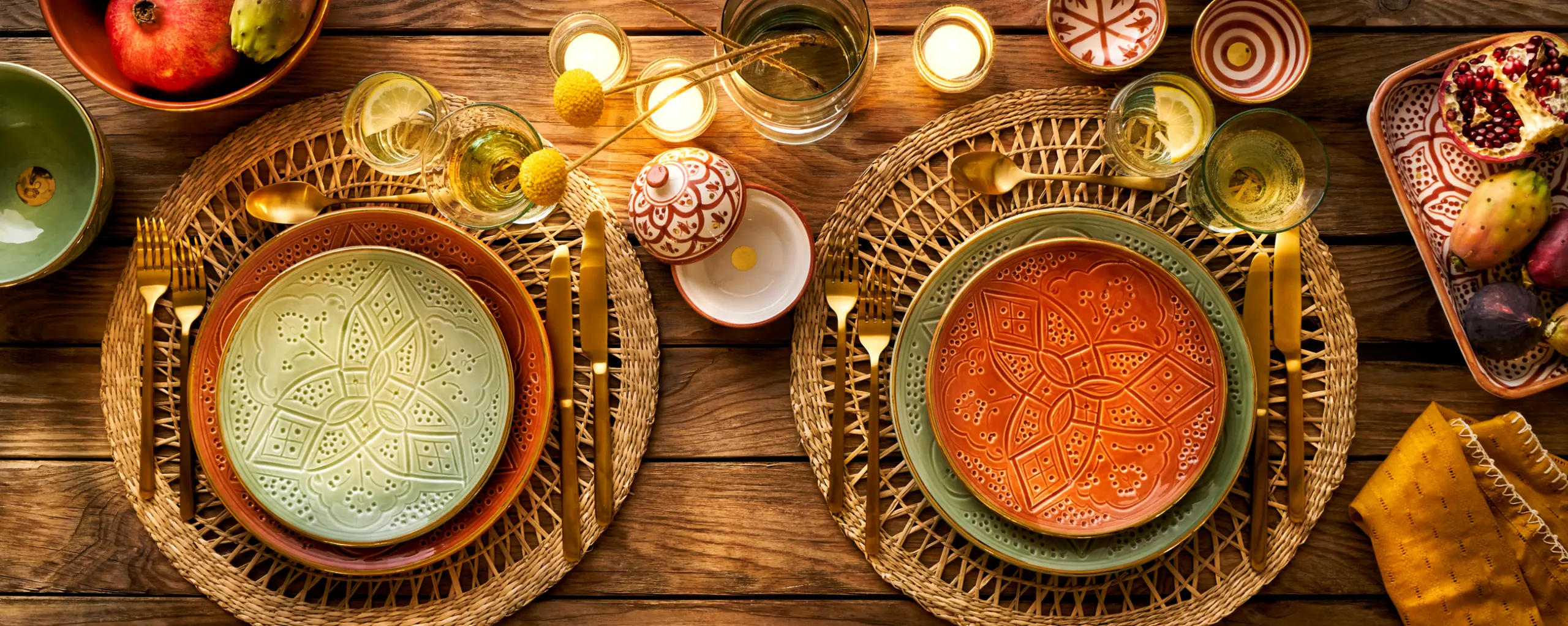 tabletop photography of plates and decoration, glasses and cutlery